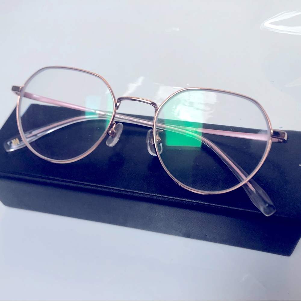 Helen Keller, pink and gold glasses. Asking for $45 or best offer.